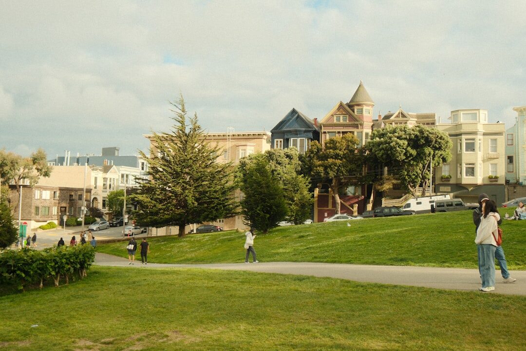 senior couple walking in neighborhood park