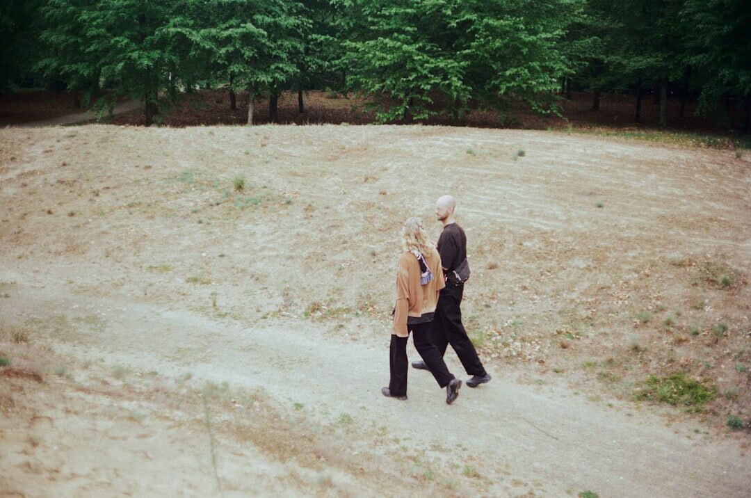 senior couple walking in park