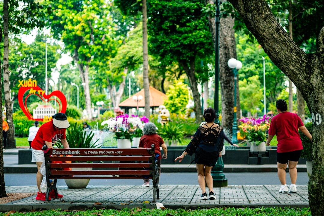 senior couple walking in neighborhood park