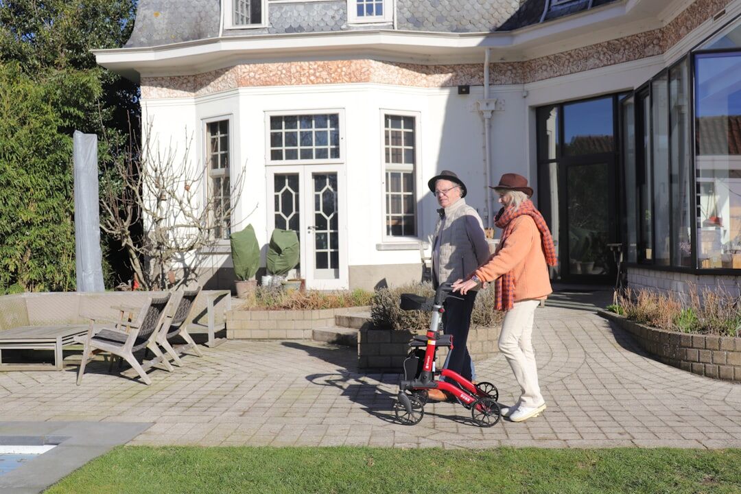 elderly people chatting in garden